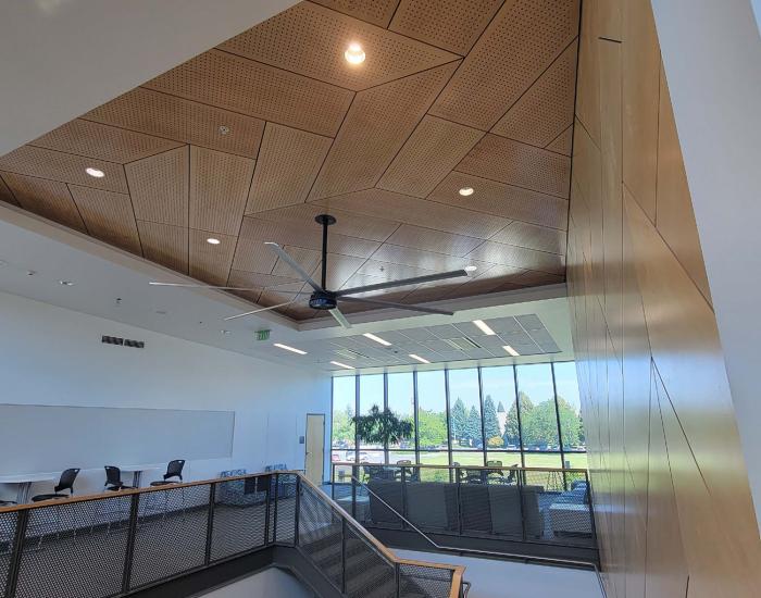A public works project that has a beautiful geometric wood space in the ceiling